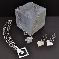 Handmade jewellery<br>Earings from £45 Bracelets and bangles from £85 Necklaces from£140 by Annie Wilson