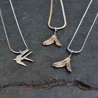 Gorse flower bracelet / pendant from &pound;40 /&pound;45<br>Flying swallow pendant from &pound;35 by Emma Ginnever