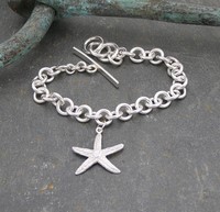 Starfish wrist chain<br>Wrist chains from £234 by Fay Page