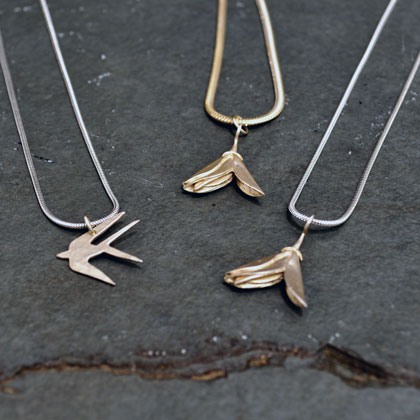 Gorse flower bracelet / pendant from &pound;40 /&pound;45<br>Flying swallow pendant from &pound;35 by Emma Ginnever